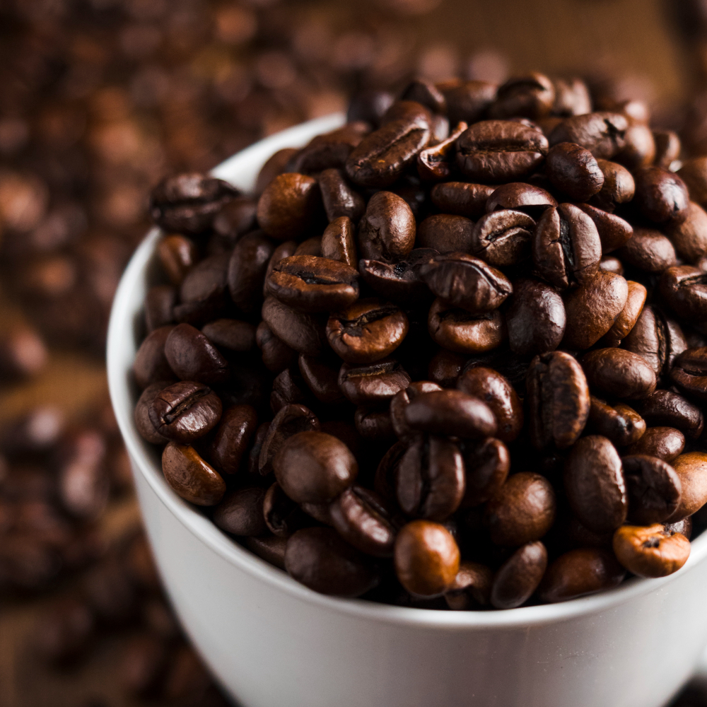 Black coffee typically has a slightly lower caffeine content